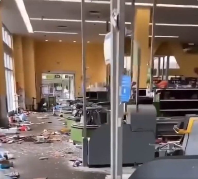 Chicago Woman Cries While Documenting the Worst Looted WalMart You've